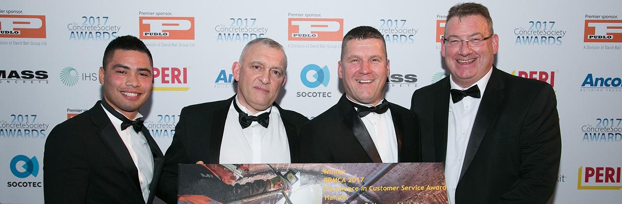 Customer service award. Pictured with the customer service award are, from left, project manager Jobert Fermilan, technical production manager Terry Balmer, Ezra Welham from Story Contracting and Hanson regional general manager Tony Gaffney.