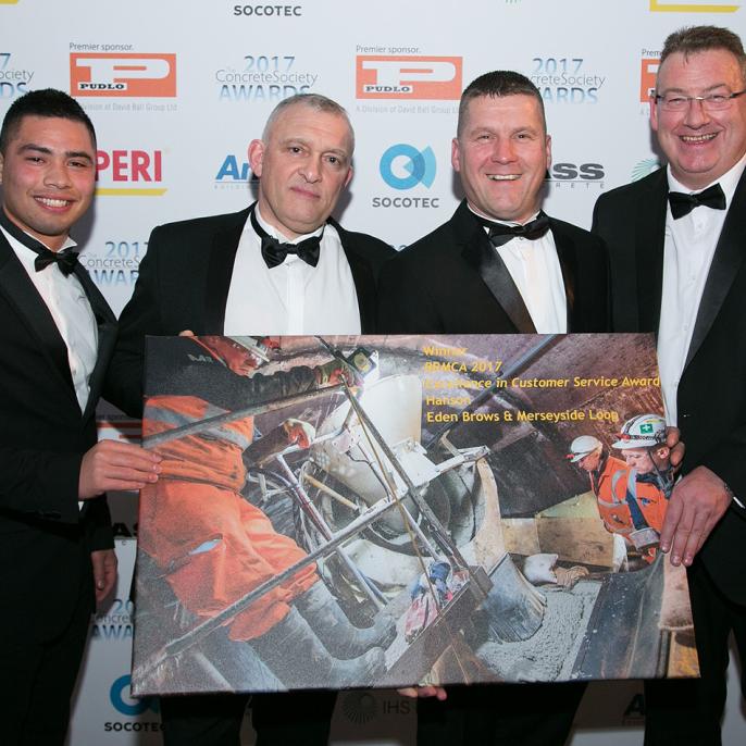 Customer service award. Pictured with the customer service award are, from left, project manager Jobert Fermilan, technical production manager Terry Balmer, Ezra Welham from Story Contracting and Hanson regional general manager Tony Gaffney.